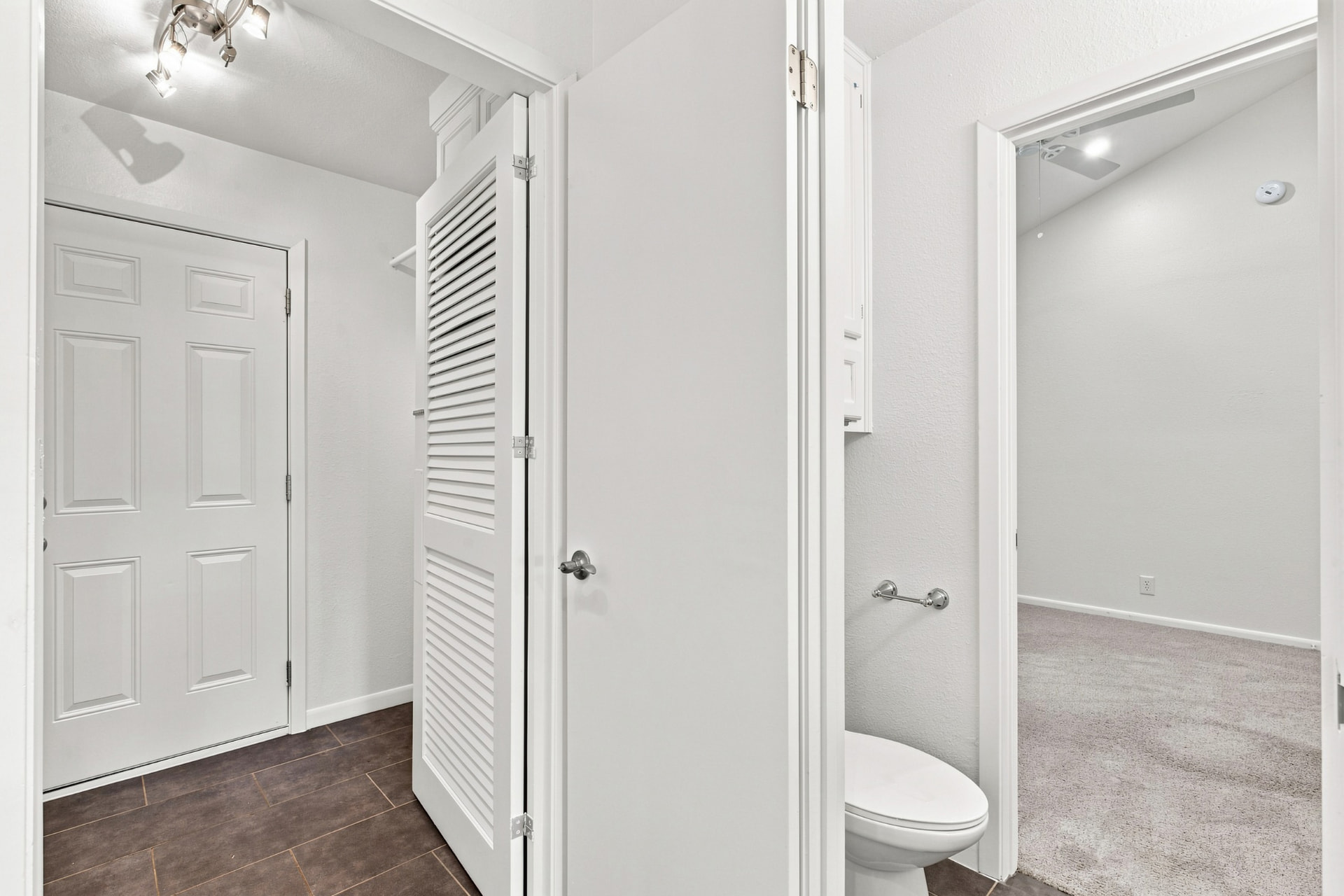 Hall bath and closet area off the bedroom wing