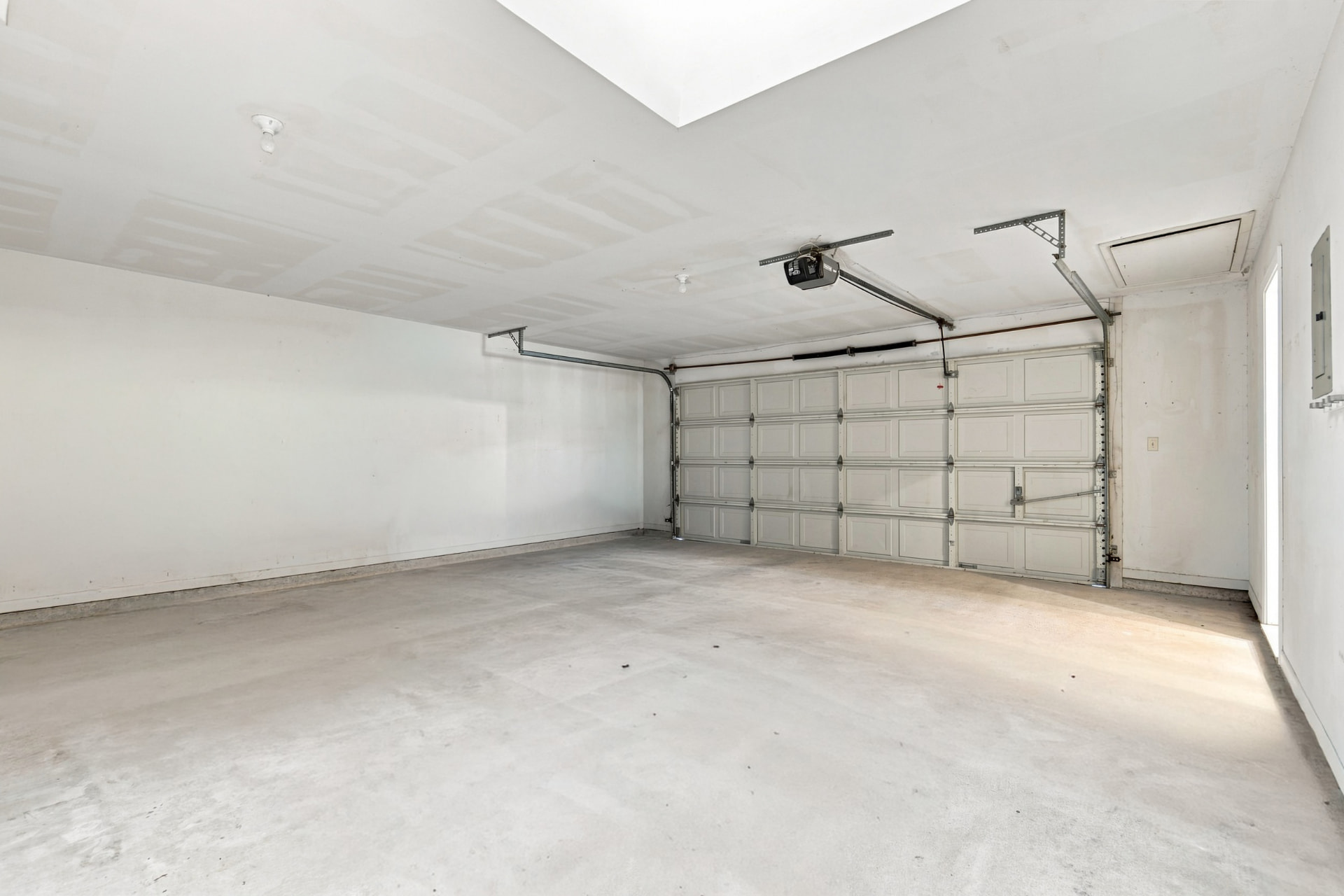 Garage interior showing door and open floor space