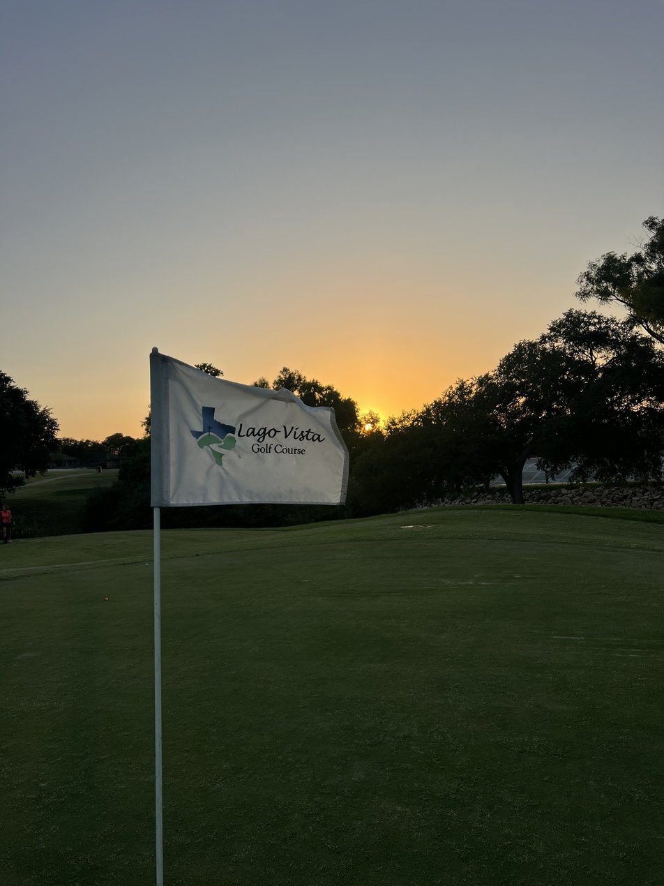 Lago Vista Golf Course pin flag at sunset